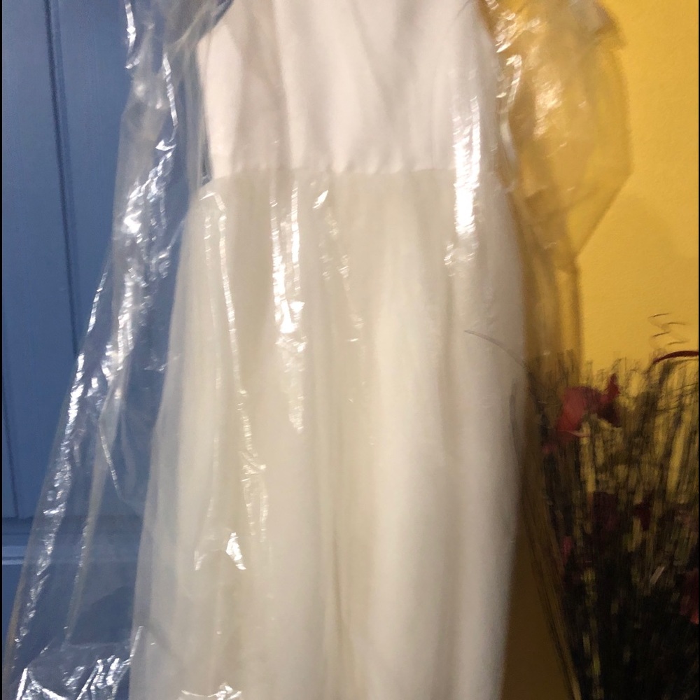 A Kids bridal dress for weddings or church.